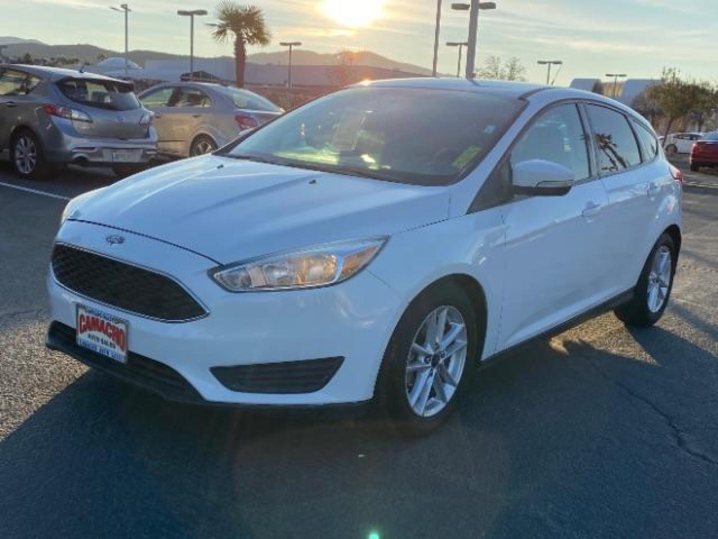 2016 WHITE Ford Focus (1FADP3K25GL) with an 4-Cyl Flex Fuel 2.0L engine, Manual 5-Spd transmission, located at 412 Auto Vista Drive, Palmdale, CA, 93551, (661) 945-0620, 34.592636, -118.136681 - Photo#2