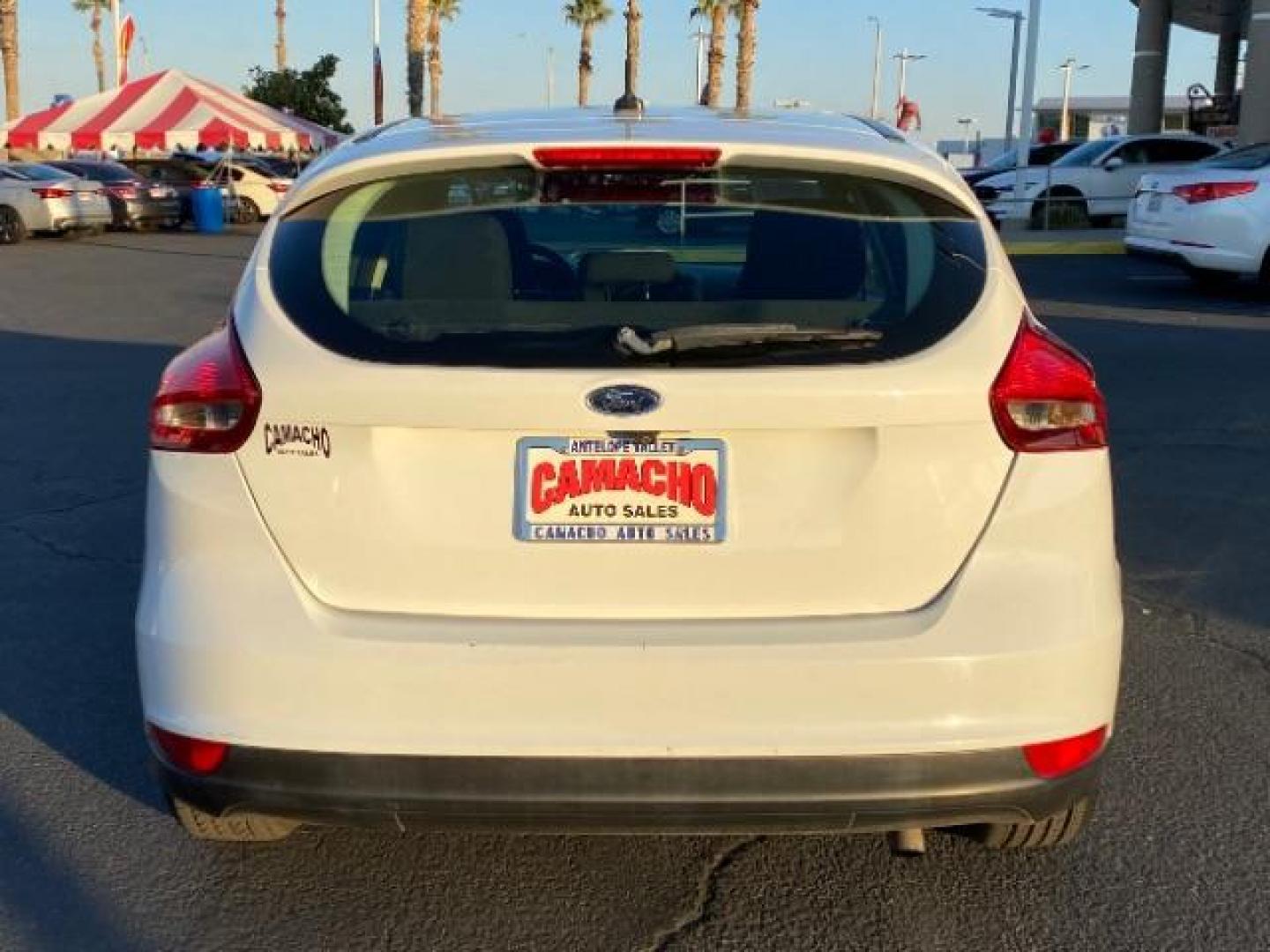 2016 WHITE Ford Focus (1FADP3K25GL) with an 4-Cyl Flex Fuel 2.0L engine, Manual 5-Spd transmission, located at 412 Auto Vista Drive, Palmdale, CA, 93551, (661) 945-0620, 34.592636, -118.136681 - Photo#4