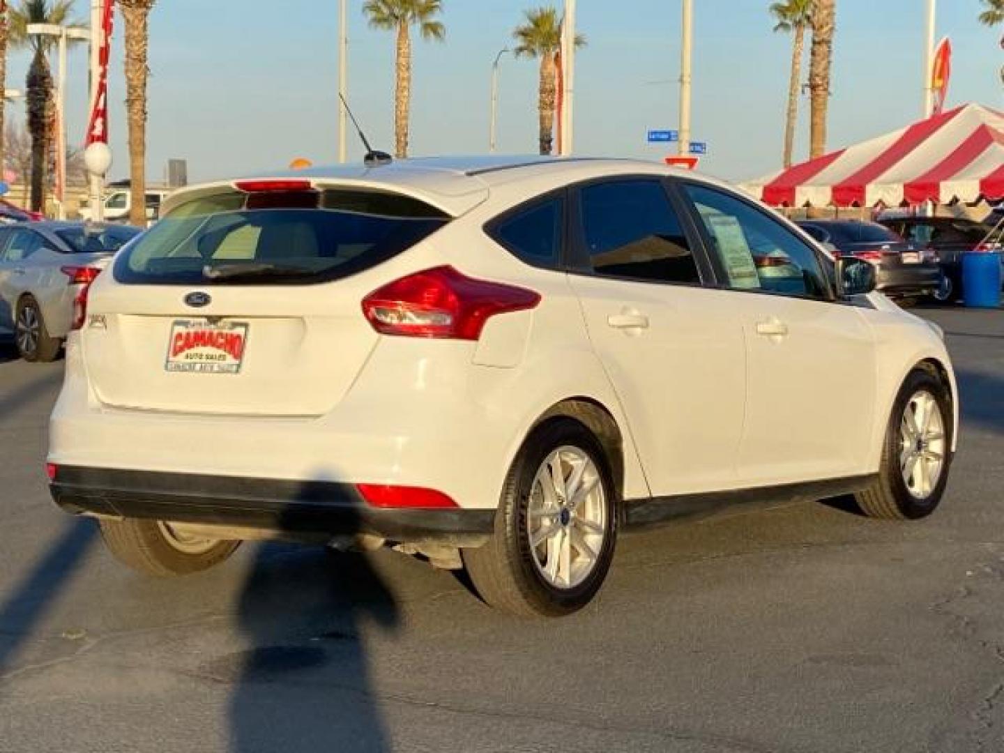 2016 WHITE Ford Focus (1FADP3K25GL) with an 4-Cyl Flex Fuel 2.0L engine, Manual 5-Spd transmission, located at 412 Auto Vista Drive, Palmdale, CA, 93551, (661) 945-0620, 34.592636, -118.136681 - Photo#5