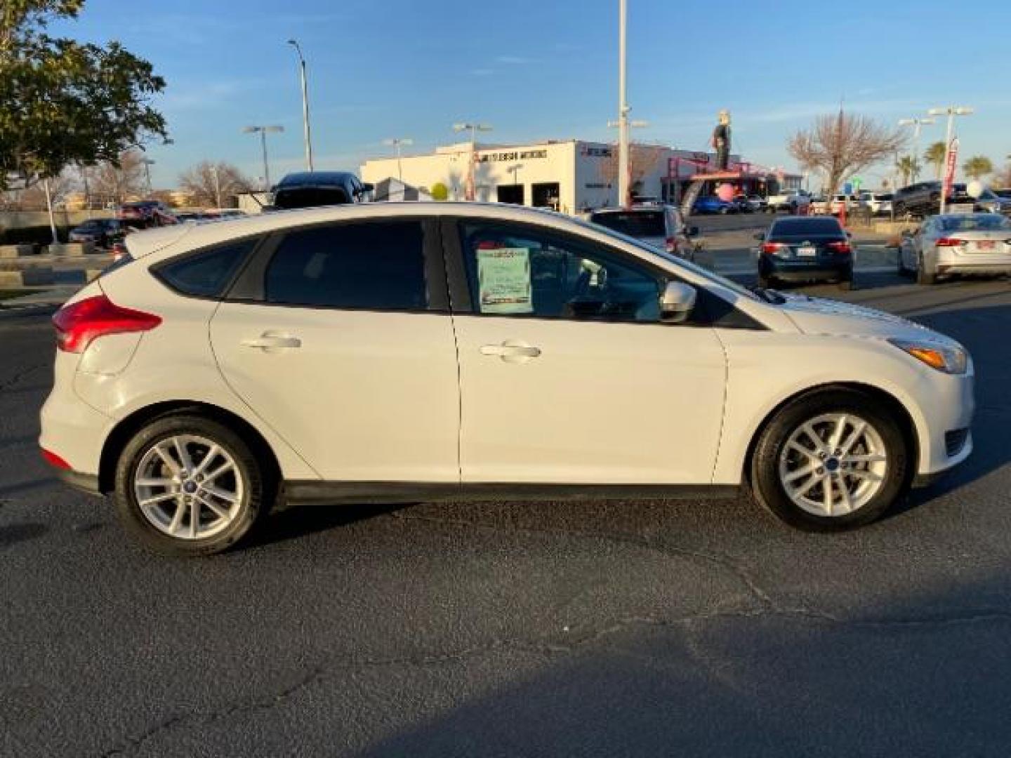 2016 WHITE Ford Focus (1FADP3K25GL) with an 4-Cyl Flex Fuel 2.0L engine, Manual 5-Spd transmission, located at 412 Auto Vista Drive, Palmdale, CA, 93551, (661) 945-0620, 34.592636, -118.136681 - Photo#6