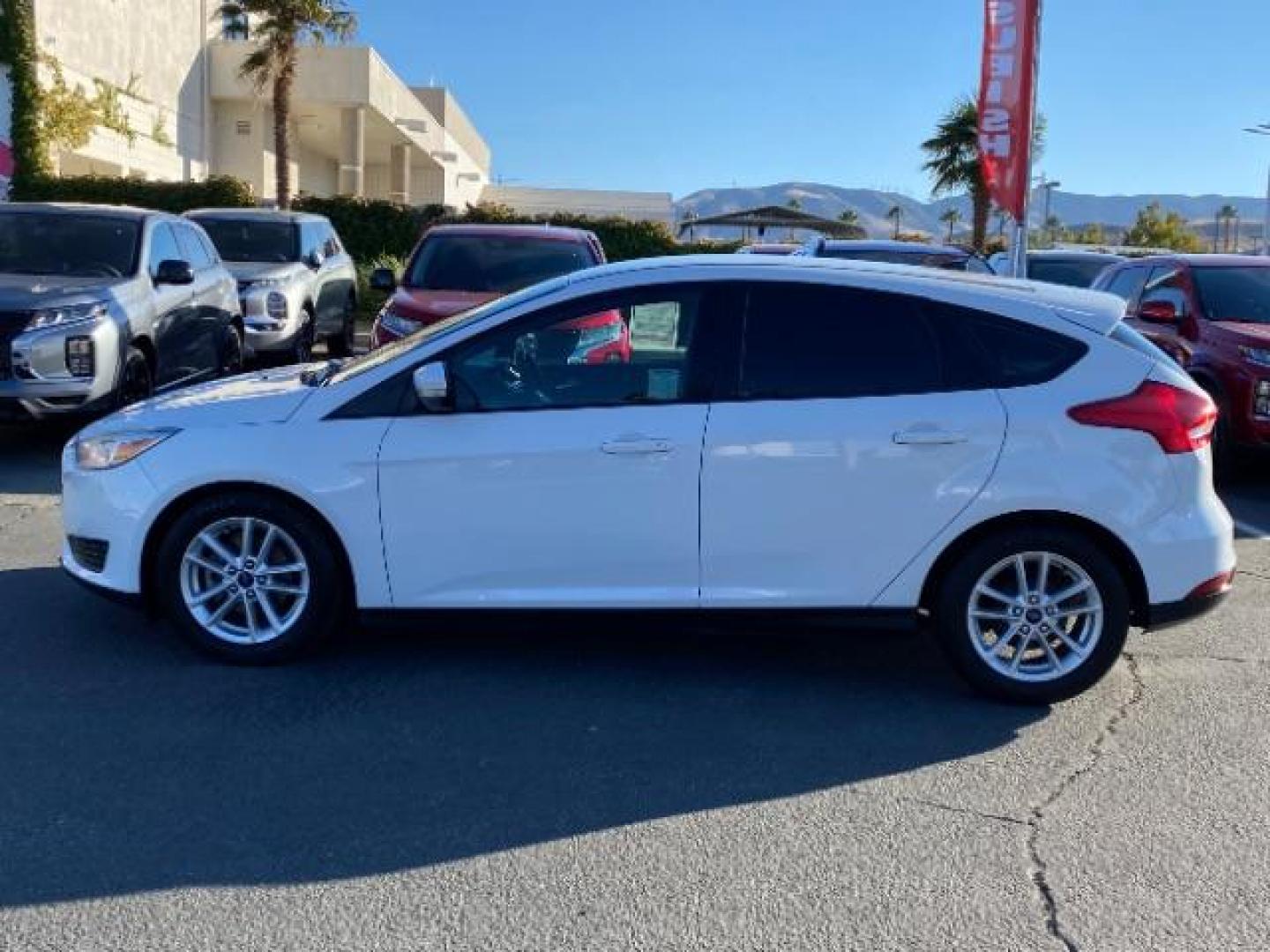 2016 WHITE Ford Focus (1FADP3K25GL) with an 4-Cyl Flex Fuel 2.0L engine, Manual 5-Spd transmission, located at 412 Auto Vista Drive, Palmdale, CA, 93551, (661) 945-0620, 34.592636, -118.136681 - Photo#18