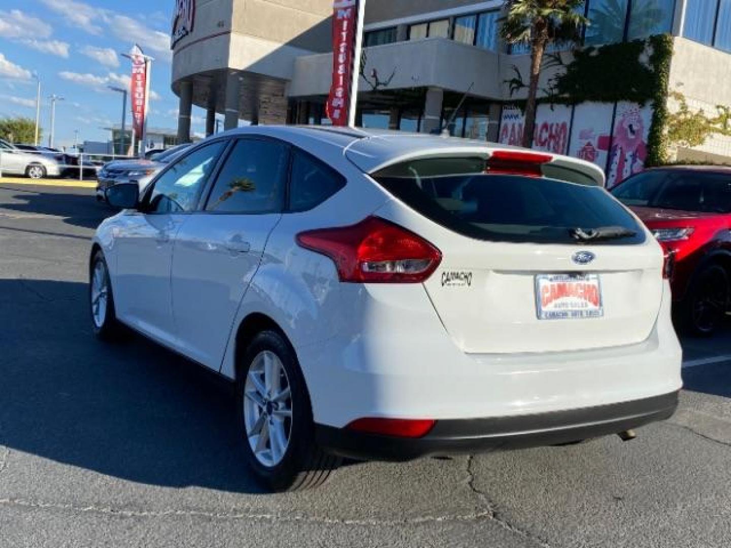 2016 WHITE Ford Focus (1FADP3K25GL) with an 4-Cyl Flex Fuel 2.0L engine, Manual 5-Spd transmission, located at 412 Auto Vista Drive, Palmdale, CA, 93551, (661) 945-0620, 34.592636, -118.136681 - Photo#19