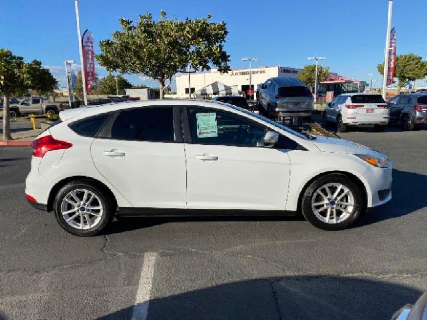 2016 WHITE Ford Focus (1FADP3K25GL) with an 4-Cyl Flex Fuel 2.0L engine, Manual 5-Spd transmission, located at 412 Auto Vista Drive, Palmdale, CA, 93551, (661) 945-0620, 34.592636, -118.136681 - Photo#22