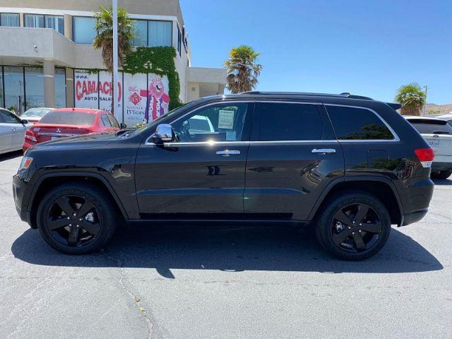 2014 Jeep Grand Cherokee (1C4RJEBM7EC) with an V6 EcoDiesel 3.0T engine, Automatic 8-Spd transmission, located at 412 Auto Vista Drive, Palmdale, CA, 93551, (661) 945-0620, 34.592636, -118.136681 - Photo#3