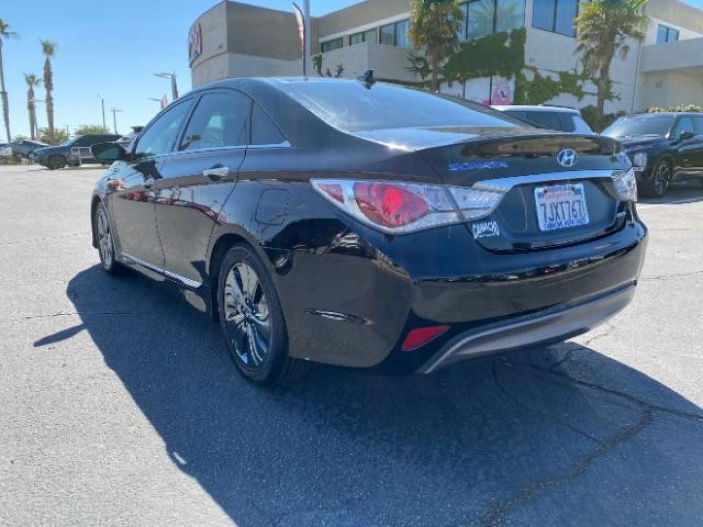 2015 BLACK HYUNDAI SONATA HYBRID (KMHEC4A44FA) , located at 412 Auto Vista Drive, Palmdale, CA, 93551, (661) 945-0620, 34.592636, -118.136681 - Photo#4