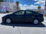 2021 BLACK Toyota Prius (JTDKAMFU1M3) with an 4-Cyl Hybrid 1.8 Liter engine, Automatic ECVT transmission, located at 412 Auto Vista Drive, Palmdale, CA, 93551, (661) 945-0620, 34.592636, -118.136681 - Photo#3