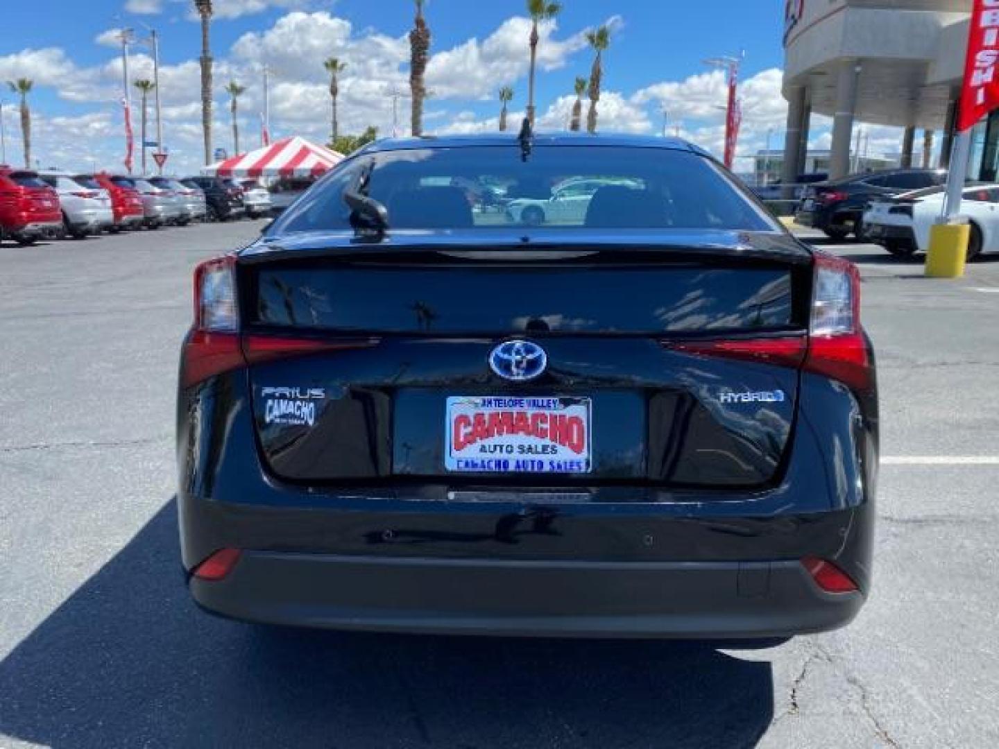 2021 BLACK Toyota Prius (JTDKAMFU1M3) with an 4-Cyl Hybrid 1.8 Liter engine, Automatic ECVT transmission, located at 412 Auto Vista Drive, Palmdale, CA, 93551, (661) 945-0620, 34.592636, -118.136681 - Photo#4