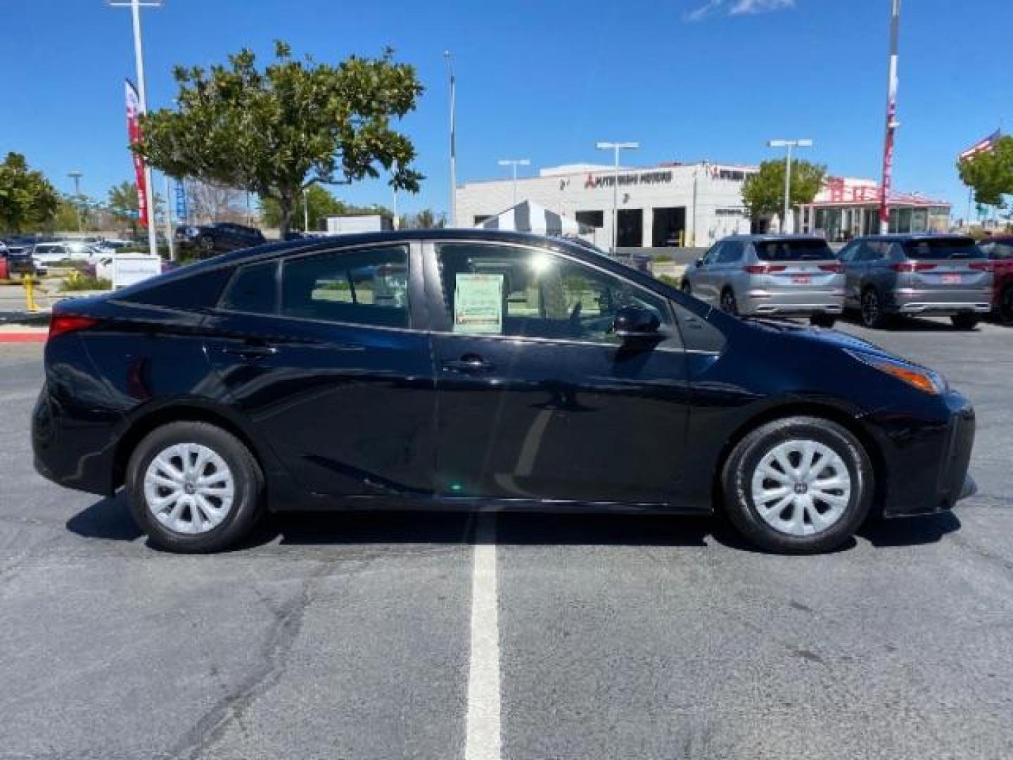 2021 BLACK Toyota Prius (JTDKAMFU1M3) with an 4-Cyl Hybrid 1.8 Liter engine, Automatic ECVT transmission, located at 412 Auto Vista Drive, Palmdale, CA, 93551, (661) 945-0620, 34.592636, -118.136681 - Photo#7