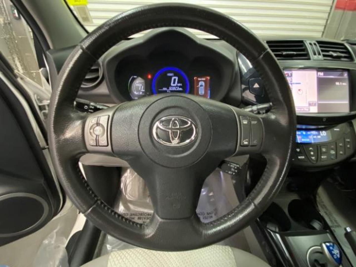 2013 WHITE Toyota RAV4 EV (2T3YL4DV2DW) with an AC Electric Motor engine, Single-Speed Fixed Gear transmission, located at 412 Auto Vista Drive, Palmdale, CA, 93551, (661) 945-0620, 34.592636, -118.136681 - Photo#12