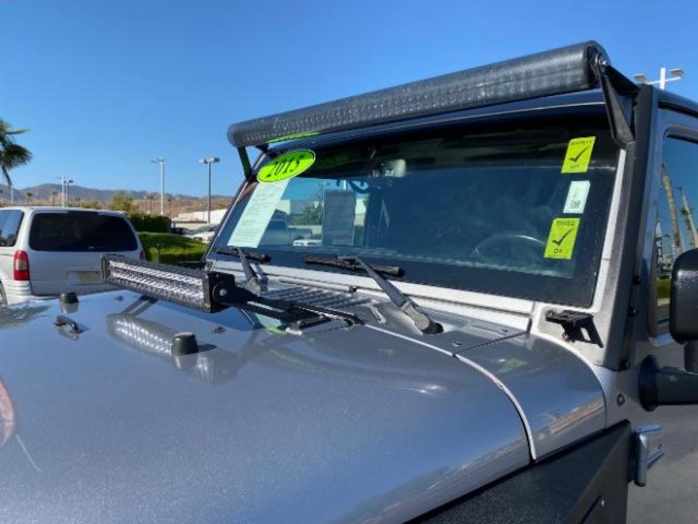 2015 GRAY Jeep Wrangler Unlimited (1C4HJWDG8FL) with an V6 3.6 Liter engine, Automatic transmission, located at 412 Auto Vista Drive, Palmdale, CA, 93551, (661) 945-0620, 34.592636, -118.136681 - Photo#14