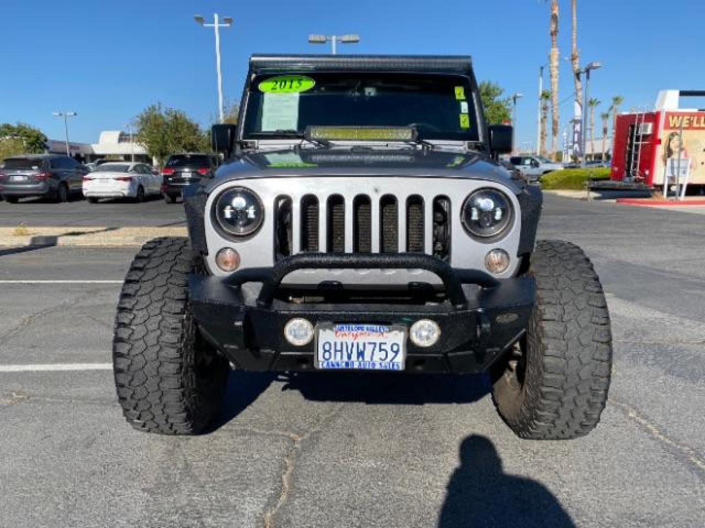 2015 GRAY Jeep Wrangler Unlimited (1C4HJWDG8FL) with an V6 3.6 Liter engine, Automatic transmission, located at 412 Auto Vista Drive, Palmdale, CA, 93551, (661) 945-0620, 34.592636, -118.136681 - Photo#1