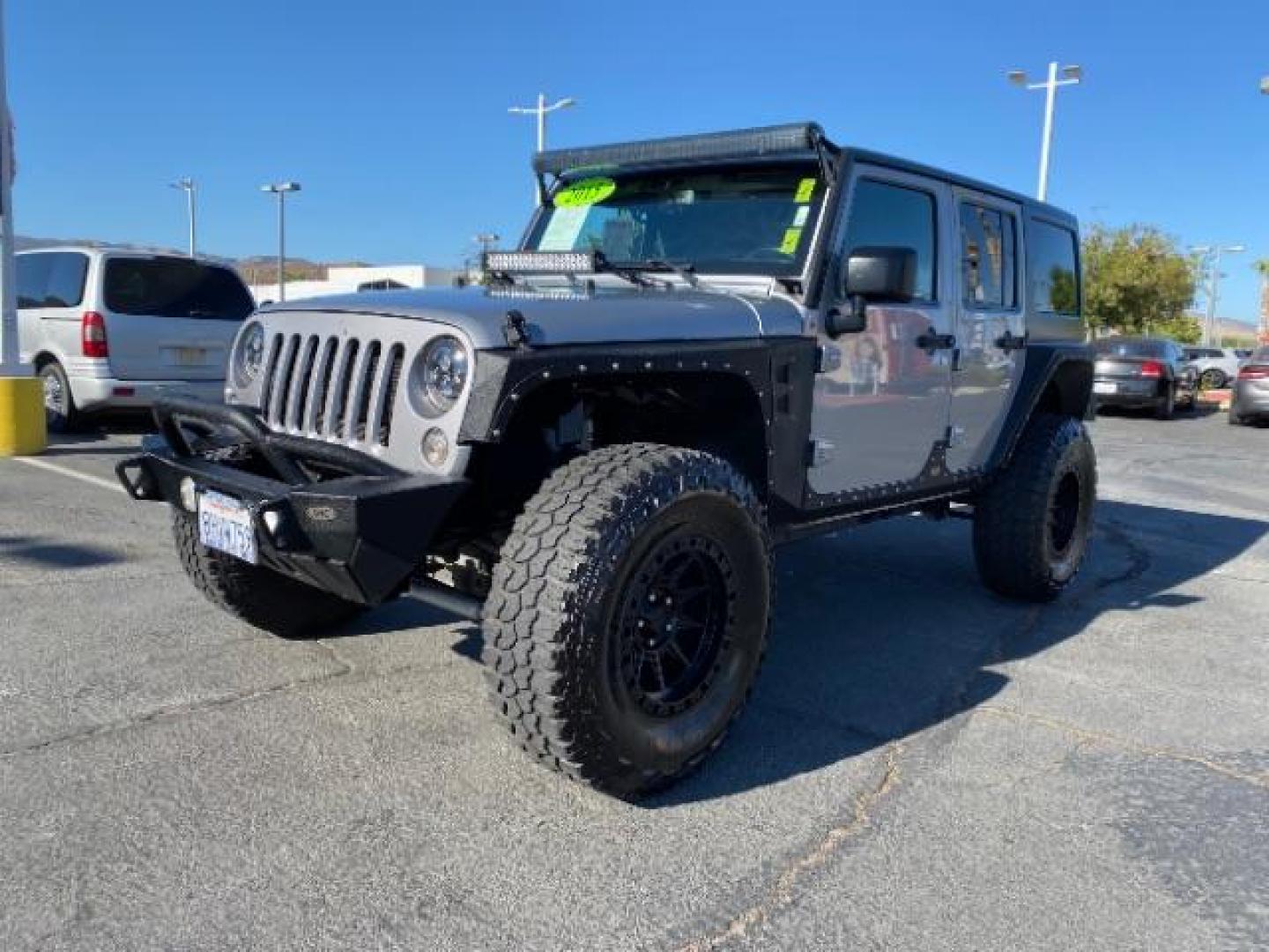 2015 GRAY Jeep Wrangler Unlimited (1C4HJWDG8FL) with an V6 3.6 Liter engine, Automatic transmission, located at 412 Auto Vista Drive, Palmdale, CA, 93551, (661) 945-0620, 34.592636, -118.136681 - Photo#2