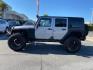 2015 GRAY Jeep Wrangler Unlimited (1C4HJWDG8FL) with an V6 3.6 Liter engine, Automatic transmission, located at 412 Auto Vista Drive, Palmdale, CA, 93551, (661) 945-0620, 34.592636, -118.136681 - Photo#3