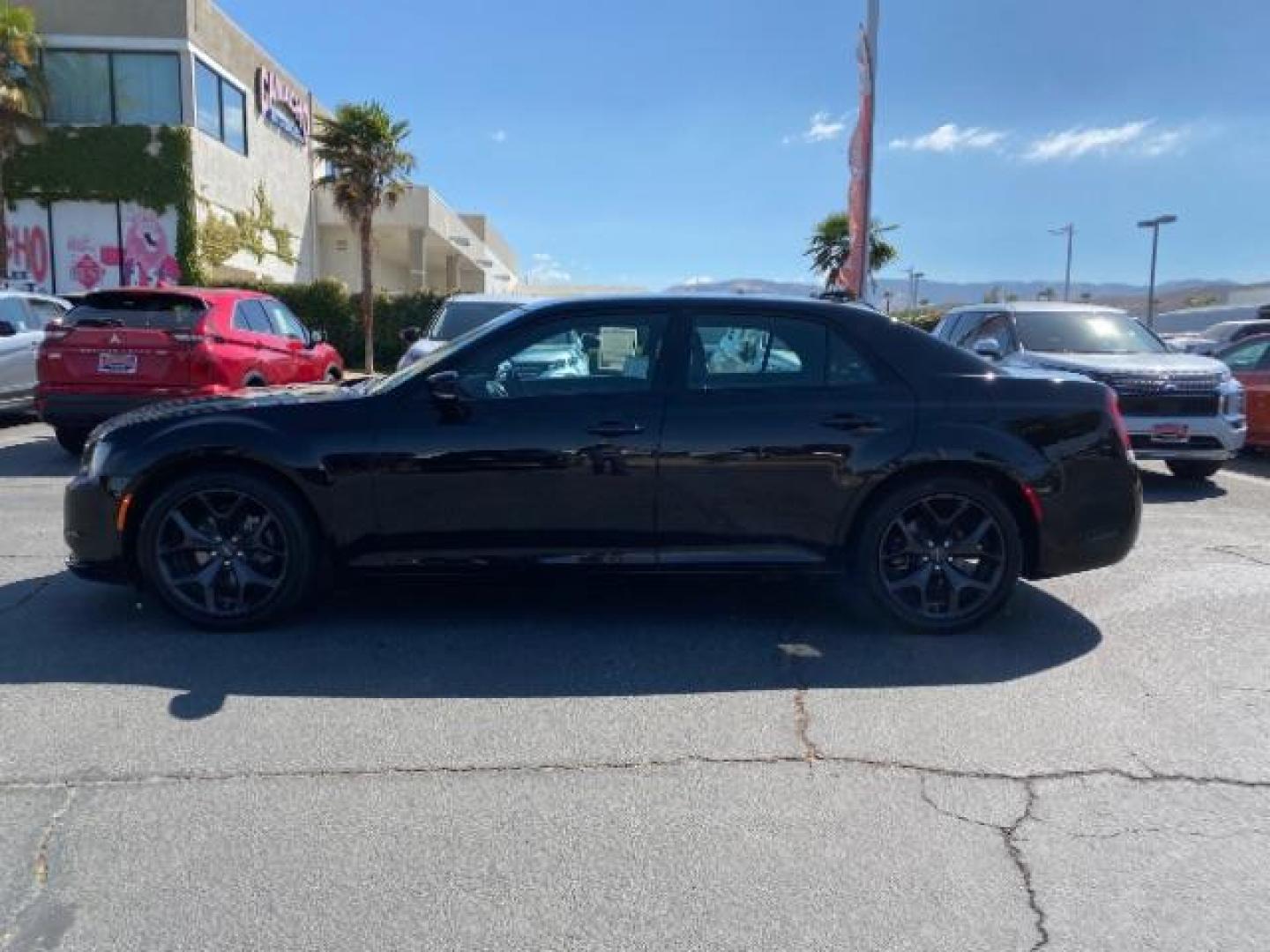 2022 BLACK Chrysler 300 (2C3CCABG1NH) with an V6 3.6 Liter engine, Automatic 8-Spd transmission, located at 412 Auto Vista Drive, Palmdale, CA, 93551, (661) 945-0620, 34.592636, -118.136681 - Photo#3