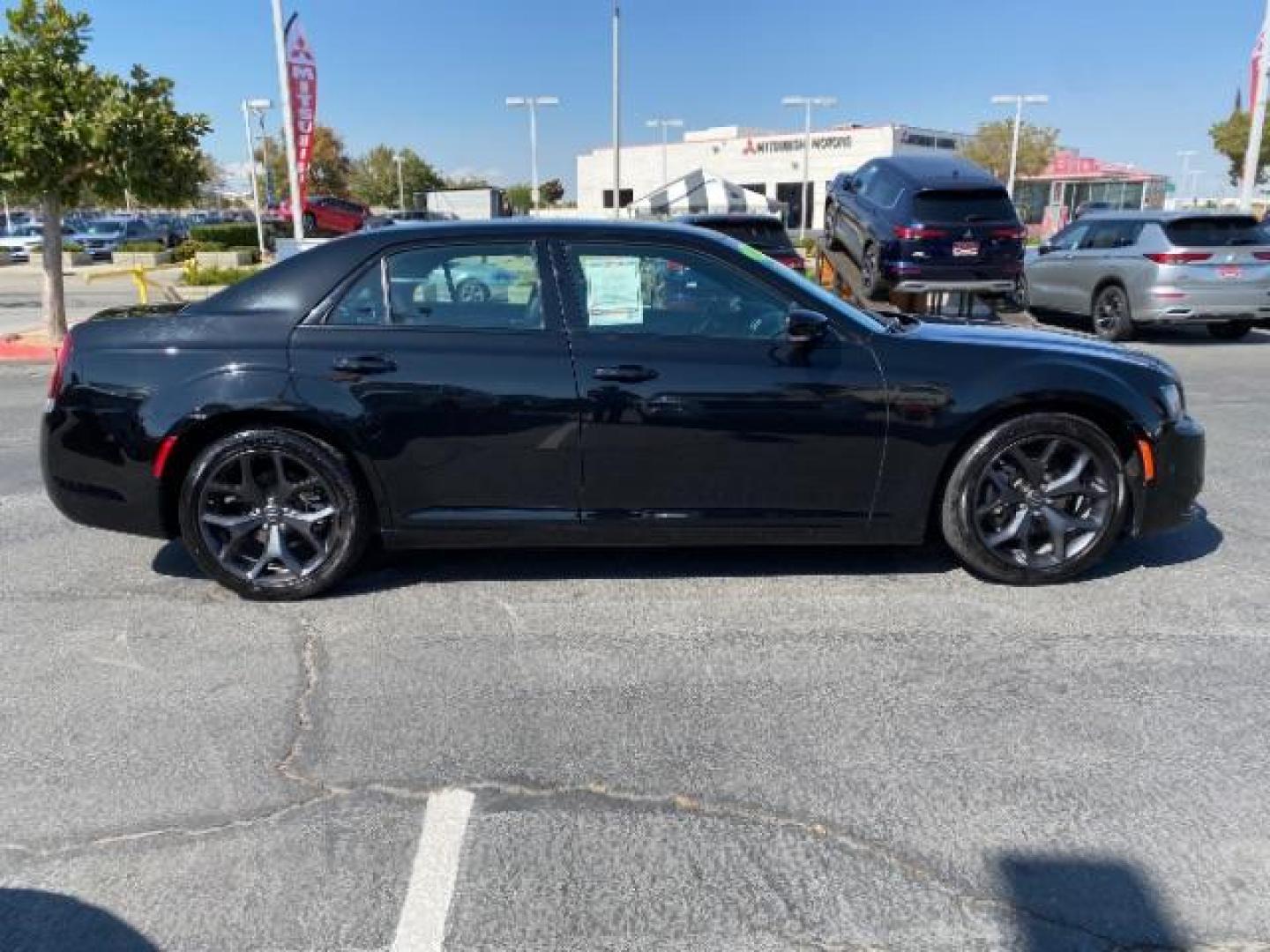 2022 BLACK Chrysler 300 (2C3CCABG1NH) with an V6 3.6 Liter engine, Automatic 8-Spd transmission, located at 412 Auto Vista Drive, Palmdale, CA, 93551, (661) 945-0620, 34.592636, -118.136681 - Photo#7