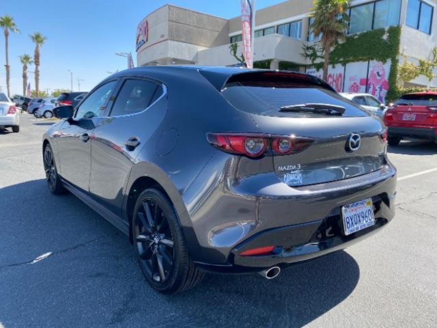 2021 GRAY Mazda Mazda3 Hatchback (JM1BPBML2M1) with an 4-Cyl SKYACTIV-G 2.5 Liter engine, Automatic 6-Spd SKYACTIV-Drive w/Manual transmission, located at 412 Auto Vista Drive, Palmdale, CA, 93551, (661) 945-0620, 34.592636, -118.136681 - Photo#4