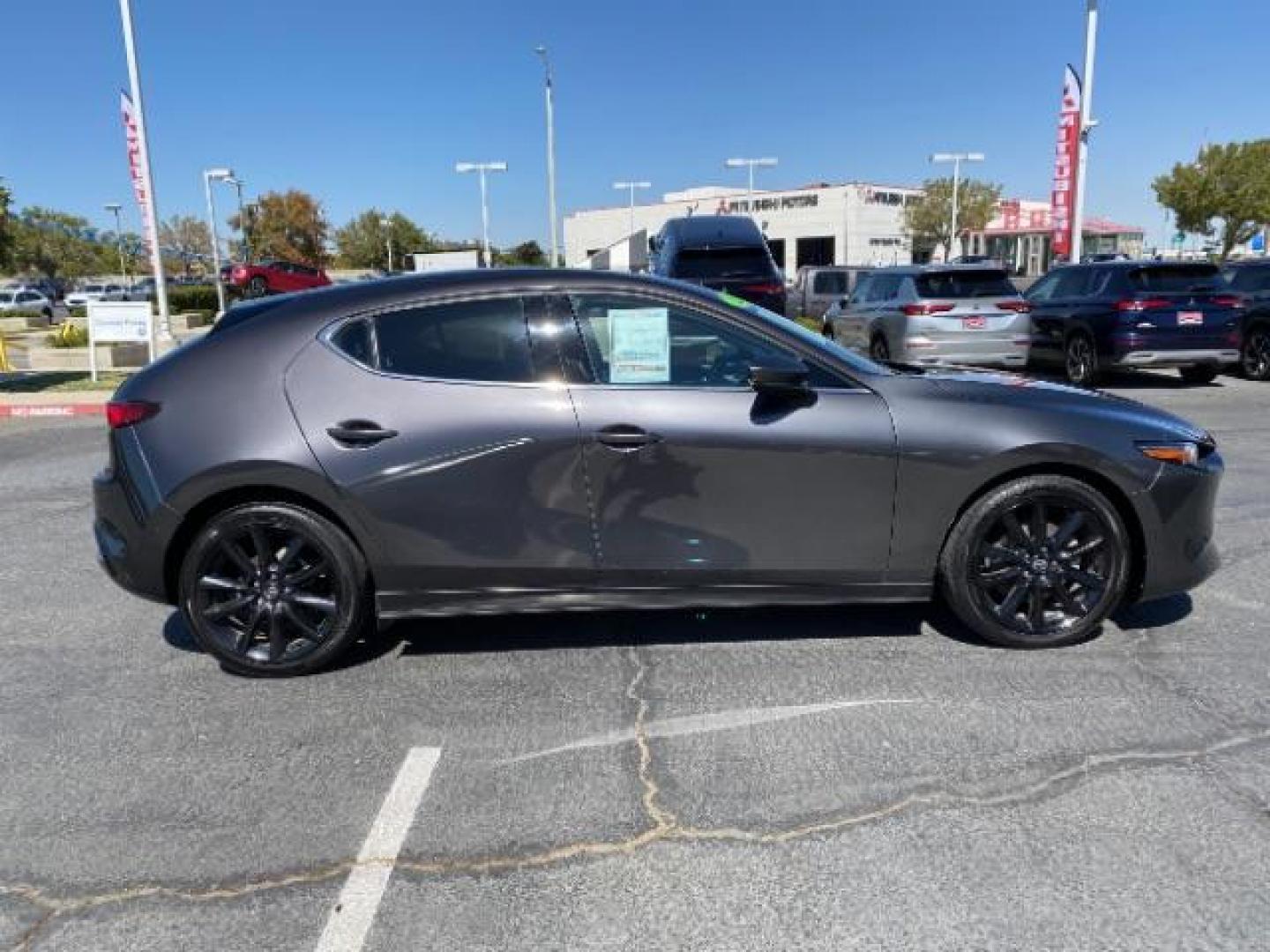 2021 GRAY Mazda Mazda3 Hatchback (JM1BPBML2M1) with an 4-Cyl SKYACTIV-G 2.5 Liter engine, Automatic 6-Spd SKYACTIV-Drive w/Manual transmission, located at 412 Auto Vista Drive, Palmdale, CA, 93551, (661) 945-0620, 34.592636, -118.136681 - Photo#7