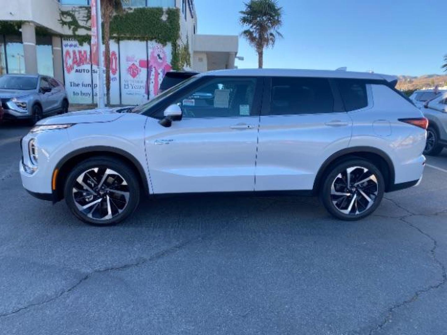 2023 WHITE Mitsubishi Outlander Plug-In Hybrid (JA4T5UA97PZ) with an 4-Cyl Hybrid 2.4 Liter engine, Automatic 1-Spd transmission, located at 412 Auto Vista Drive, Palmdale, CA, 93551, (661) 945-0620, 34.592636, -118.136681 - Photo#3