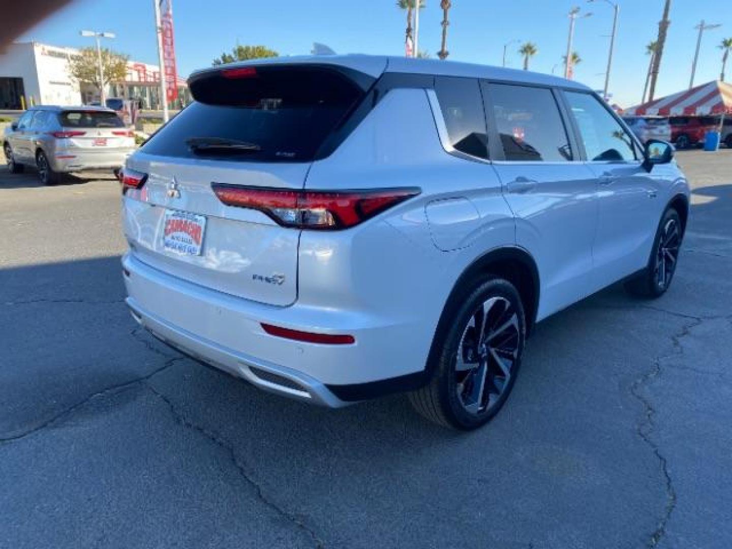 2023 WHITE Mitsubishi Outlander Plug-In Hybrid (JA4T5UA97PZ) with an 4-Cyl Hybrid 2.4 Liter engine, Automatic 1-Spd transmission, located at 412 Auto Vista Drive, Palmdale, CA, 93551, (661) 945-0620, 34.592636, -118.136681 - Photo#6