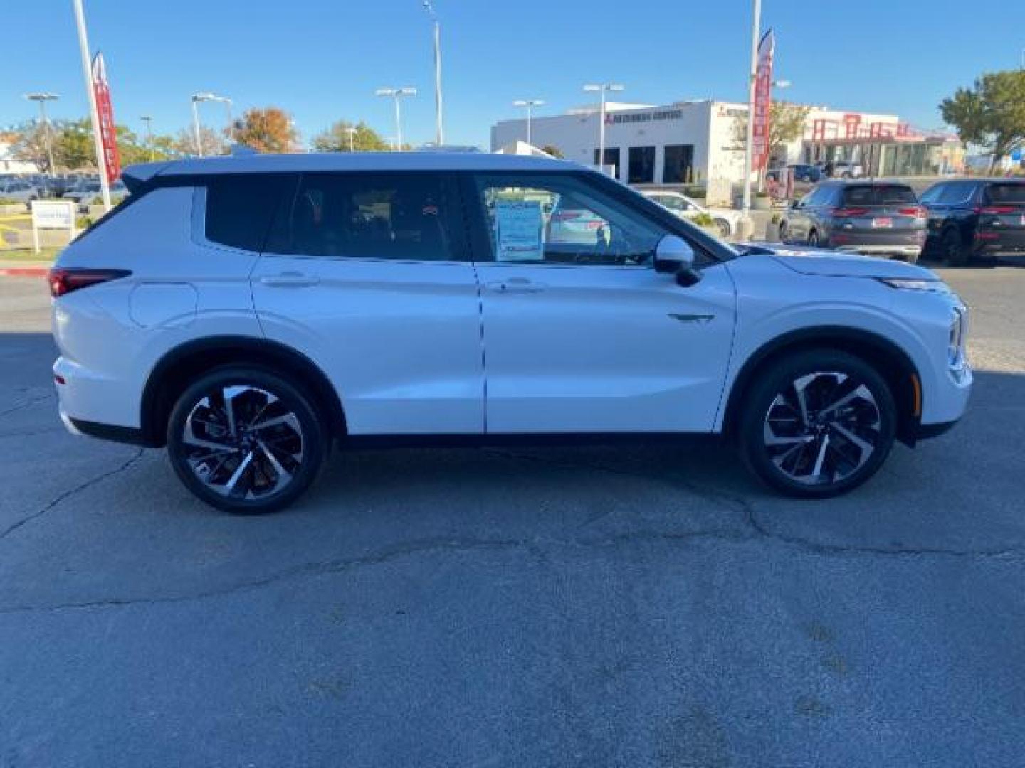 2023 WHITE Mitsubishi Outlander Plug-In Hybrid (JA4T5UA97PZ) with an 4-Cyl Hybrid 2.4 Liter engine, Automatic 1-Spd transmission, located at 412 Auto Vista Drive, Palmdale, CA, 93551, (661) 945-0620, 34.592636, -118.136681 - Photo#7