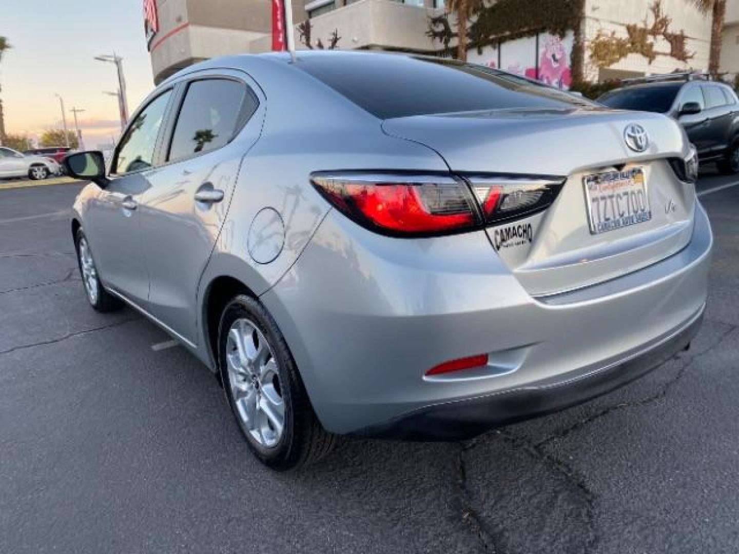 2017 SILVER Toyota Yaris iA (3MYDLBYVXHY) with an 4-Cyl 1.5 Liter engine, Automatic 6-Spd transmission, located at 412 Auto Vista Drive, Palmdale, CA, 93551, (661) 945-0620, 34.592636, -118.136681 - Photo#4