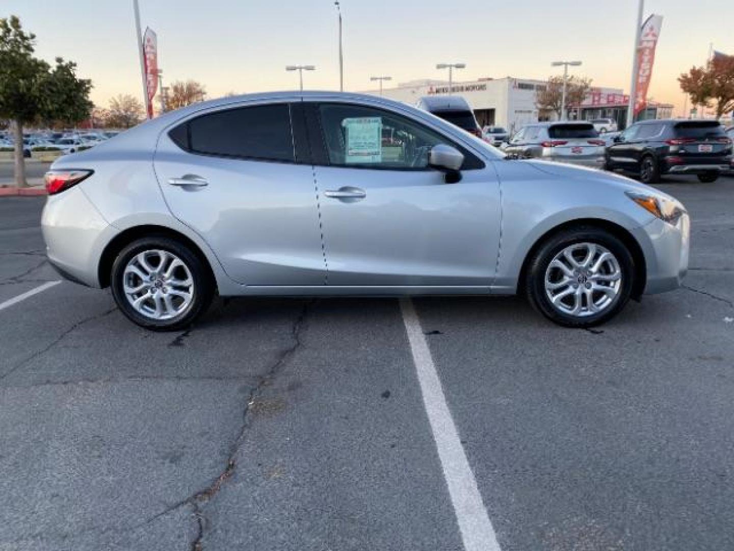 2017 SILVER Toyota Yaris iA (3MYDLBYVXHY) with an 4-Cyl 1.5 Liter engine, Automatic 6-Spd transmission, located at 412 Auto Vista Drive, Palmdale, CA, 93551, (661) 945-0620, 34.592636, -118.136681 - Photo#7