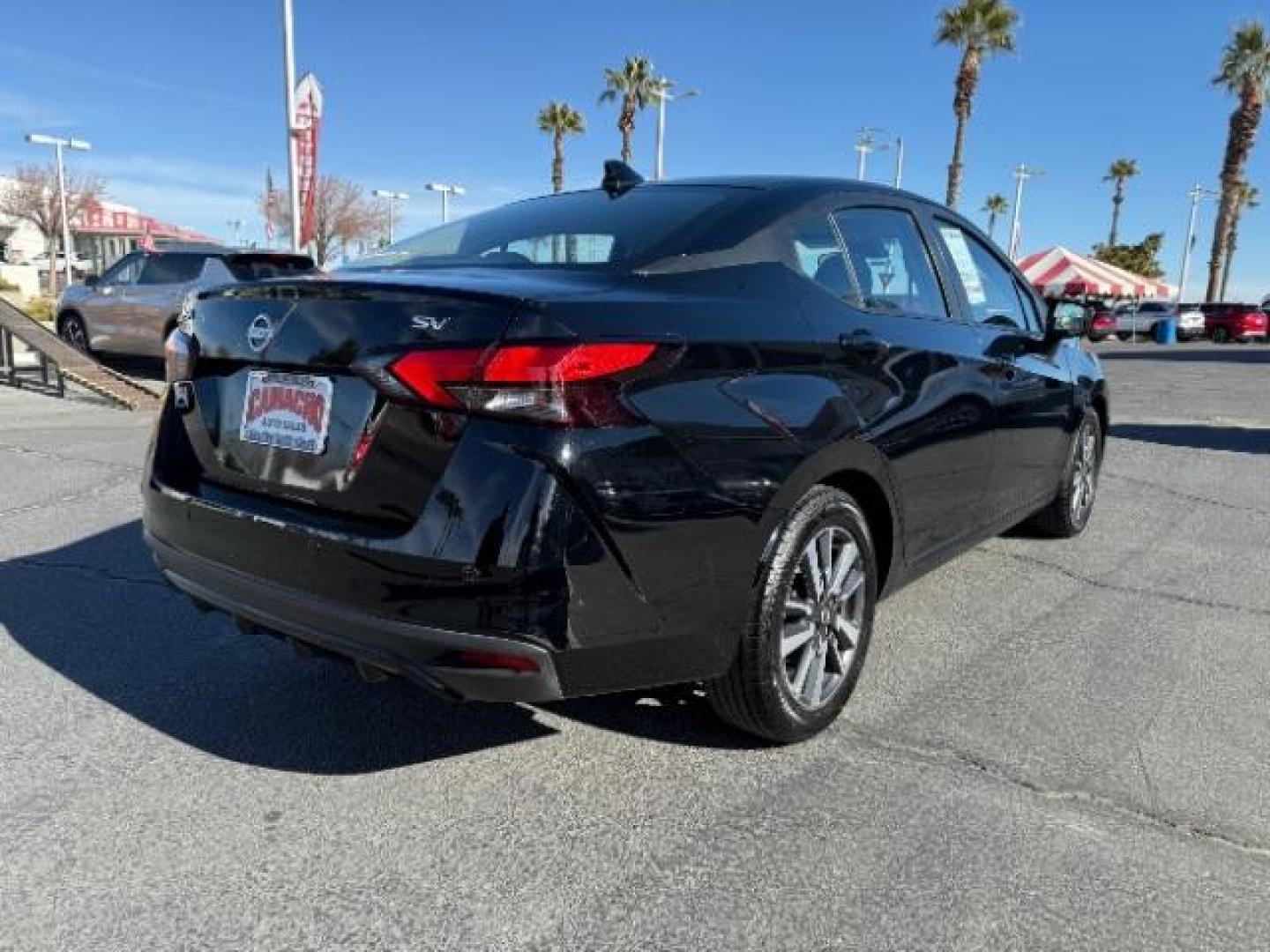 2021 BLACK Nissan Versa (3N1CN8EV9ML) with an 4-Cyl 1.6 Liter engine, Automatic CVT w/Xtronic transmission, located at 412 Auto Vista Drive, Palmdale, CA, 93551, (661) 945-0620, 34.592636, -118.136681 - Photo#6