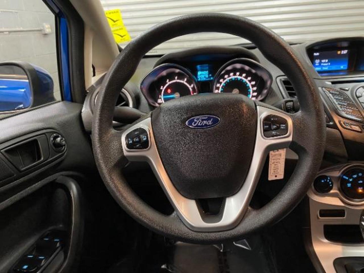 2019 blue Ford Fiesta (3FADP4EJ3KM) with an 4-Cyl 1.6 Liter engine, Automatic transmission, located at 412 Auto Vista Drive, Palmdale, CA, 93551, (661) 945-0620, 34.592636, -118.136681 - Photo#9