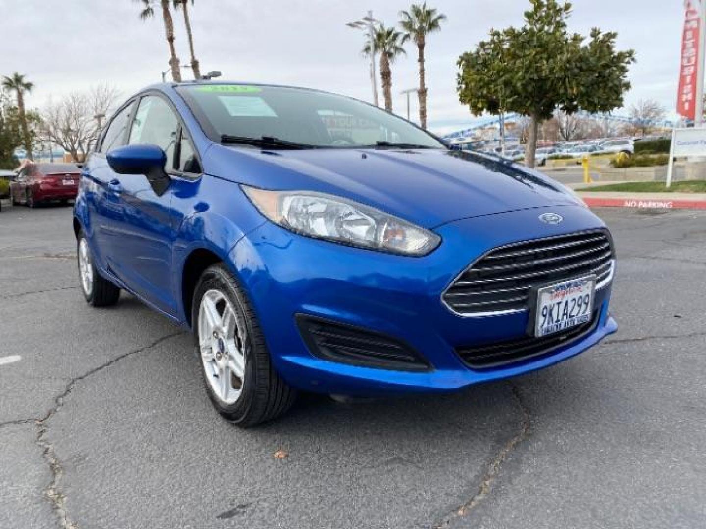 2019 blue Ford Fiesta (3FADP4EJ3KM) with an 4-Cyl 1.6 Liter engine, Automatic transmission, located at 412 Auto Vista Drive, Palmdale, CA, 93551, (661) 945-0620, 34.592636, -118.136681 - Photo#0