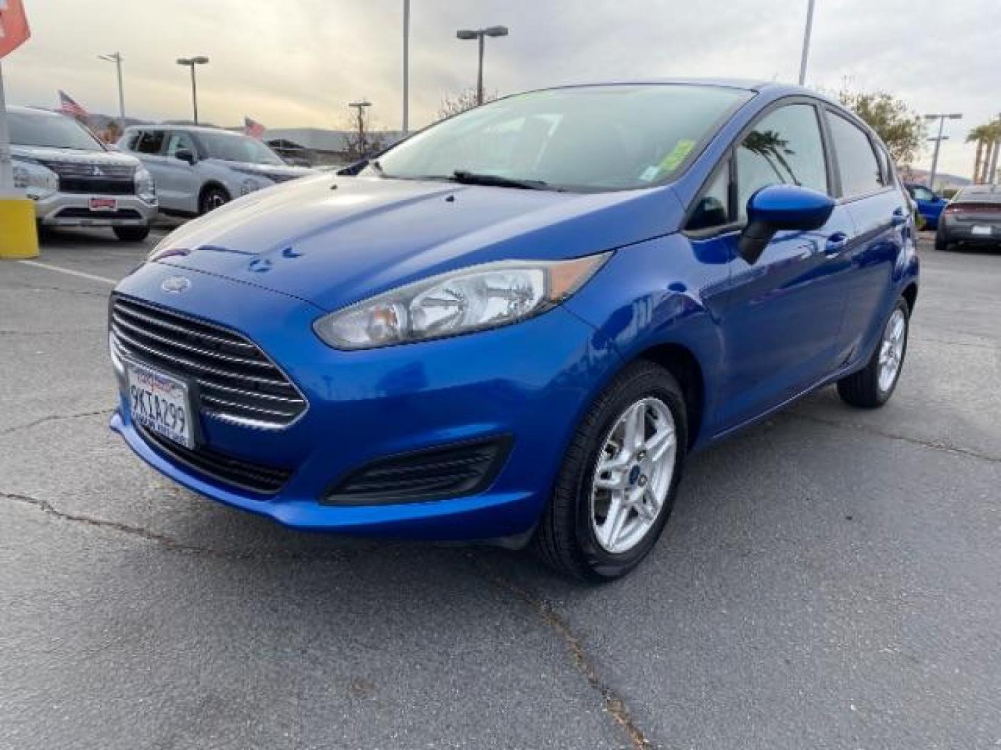 2019 blue Ford Fiesta (3FADP4EJ3KM) with an 4-Cyl 1.6 Liter engine, Automatic transmission, located at 412 Auto Vista Drive, Palmdale, CA, 93551, (661) 945-0620, 34.592636, -118.136681 - Photo#2