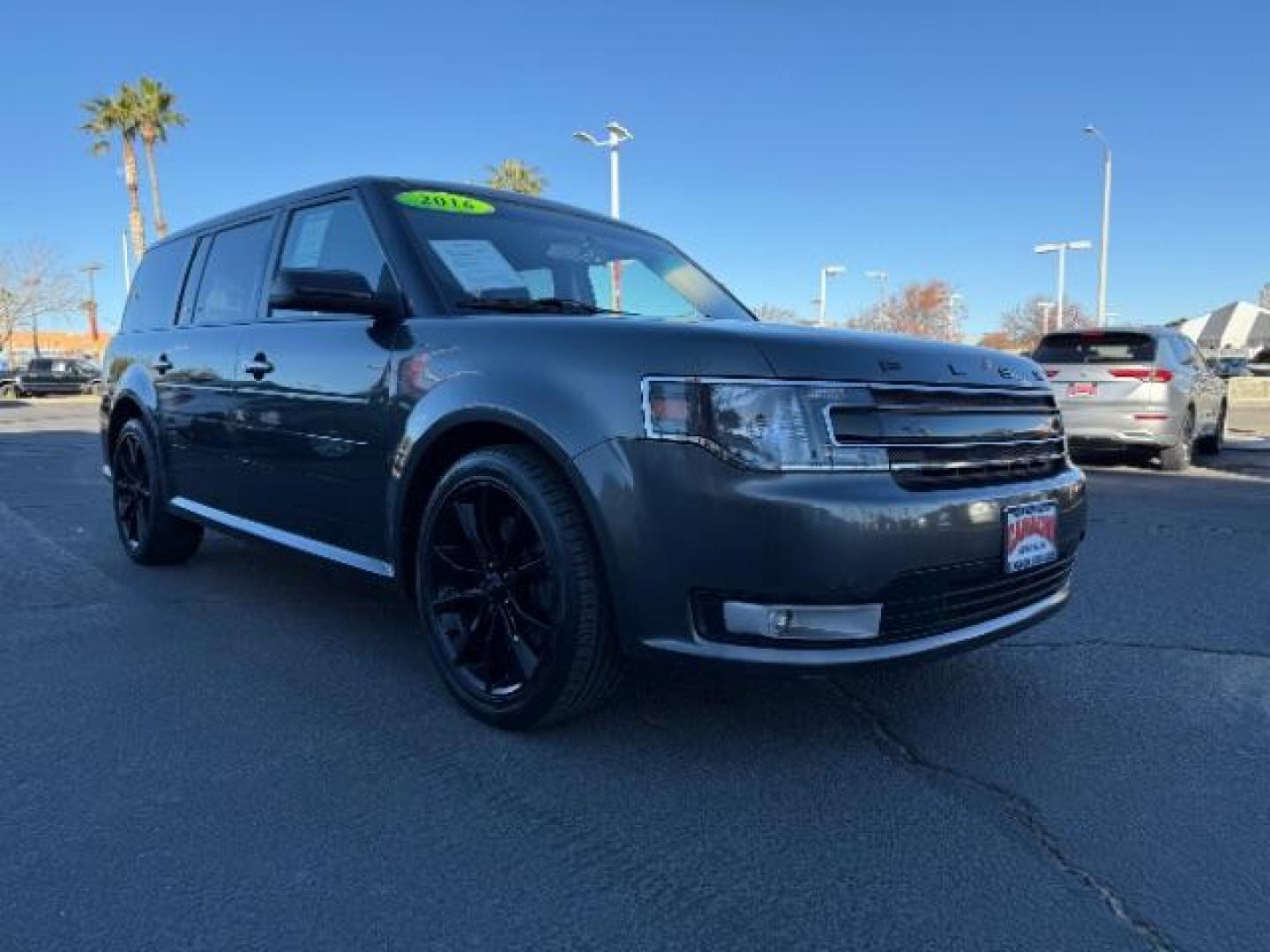 2016 BLACK Ford Flex (2FMHK6C89GB) with an V6 3.5 Liter engine, Auto 6-Spd w/SelShft transmission, located at 412 Auto Vista Drive, Palmdale, CA, 93551, (661) 945-0620, 34.592636, -118.136681 - Photo#0