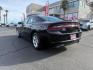 2022 BLACK Dodge Charger (2C3CDXBGXNH) with an V6 3.6 Liter engine, Automatic 8-Spd w/AutoStick transmission, located at 412 Auto Vista Drive, Palmdale, CA, 93551, (661) 945-0620, 34.592636, -118.136681 - Photo#4